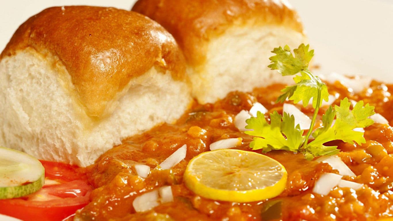 Indian pav bhaji with fresh garnish