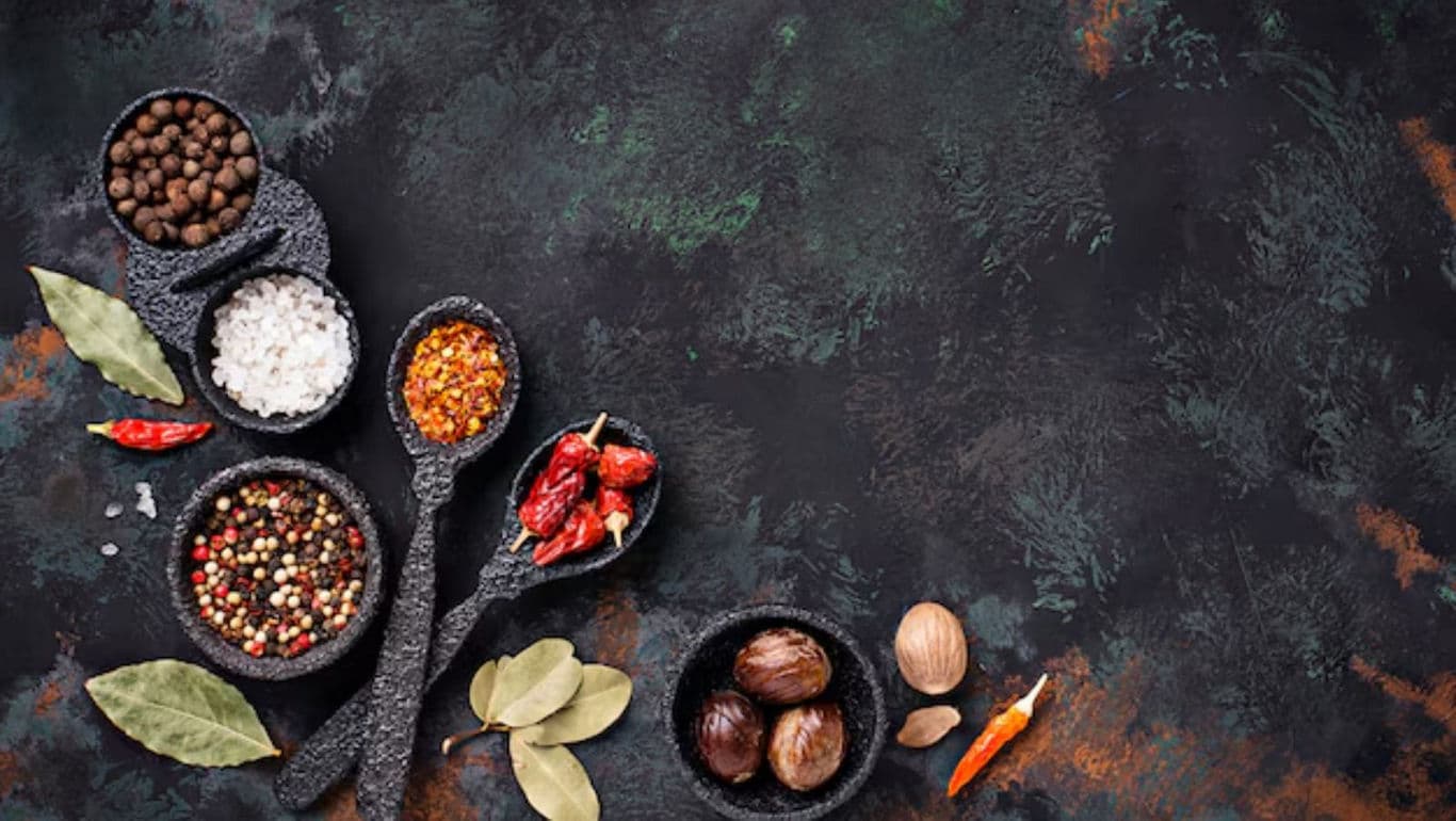 Assorted Spices in Rustic Black Bowls