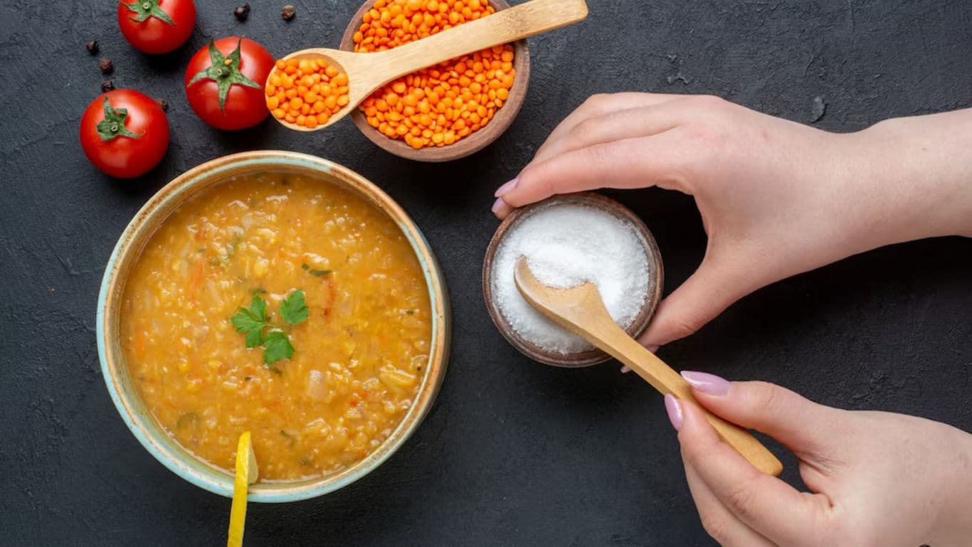 Lentil soup preparation with fresh ingredients