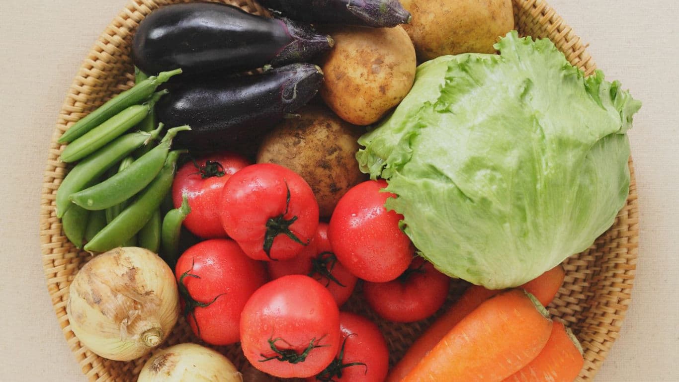 Assorted Fresh Vegetables in Woven Basket Display