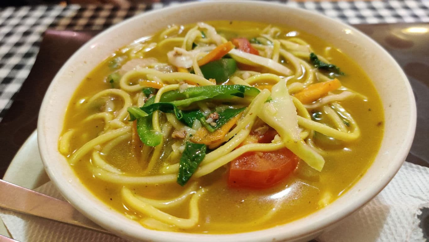 Bowl of noodle soup with vegetables