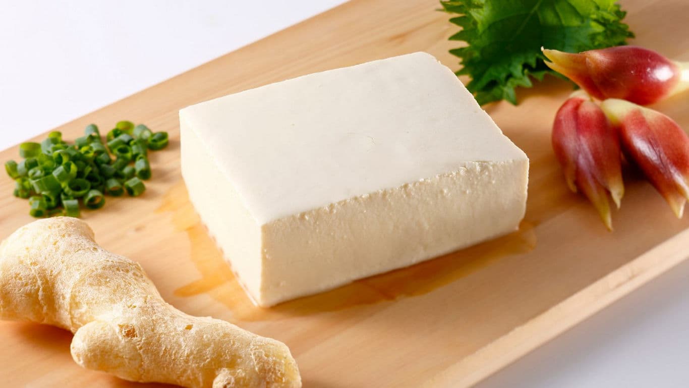 Fresh tofu with ginger and herbs