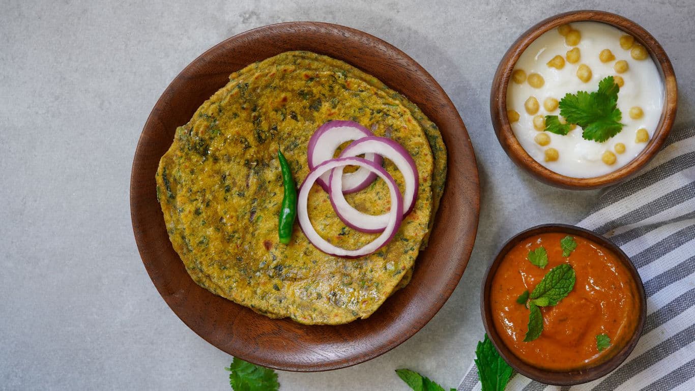 Indian flatbread with chutney and yogurt