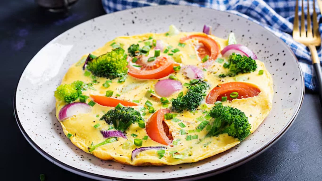 Vegetable omelette with broccoli and tomatoes