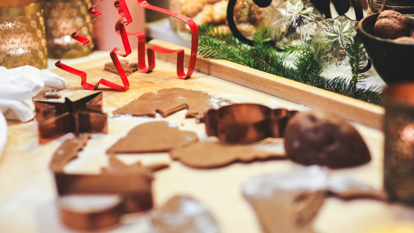 Festive Cookie Cutters on Baking Table