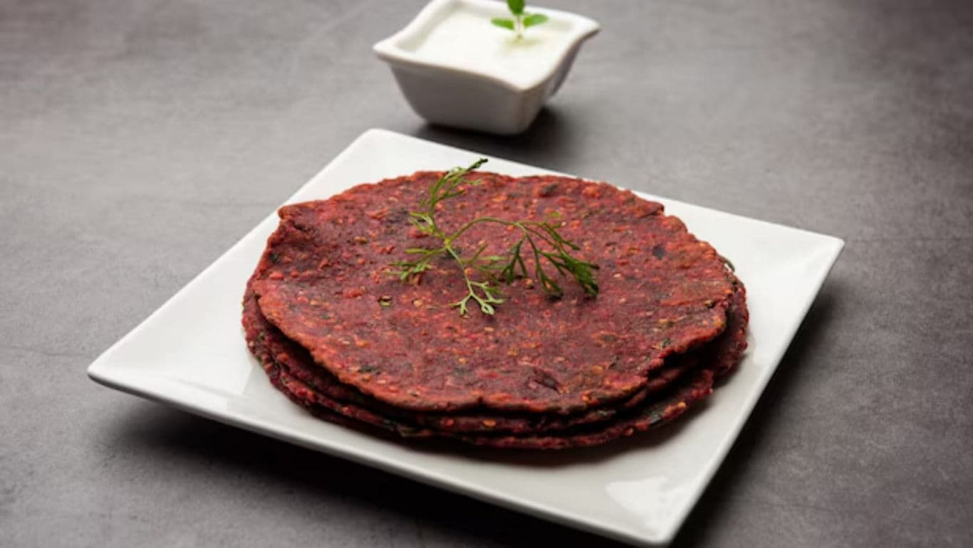Stack of beetroot flatbreads with yogurt dip