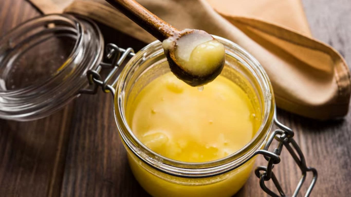 Glass jar of golden clarified butter