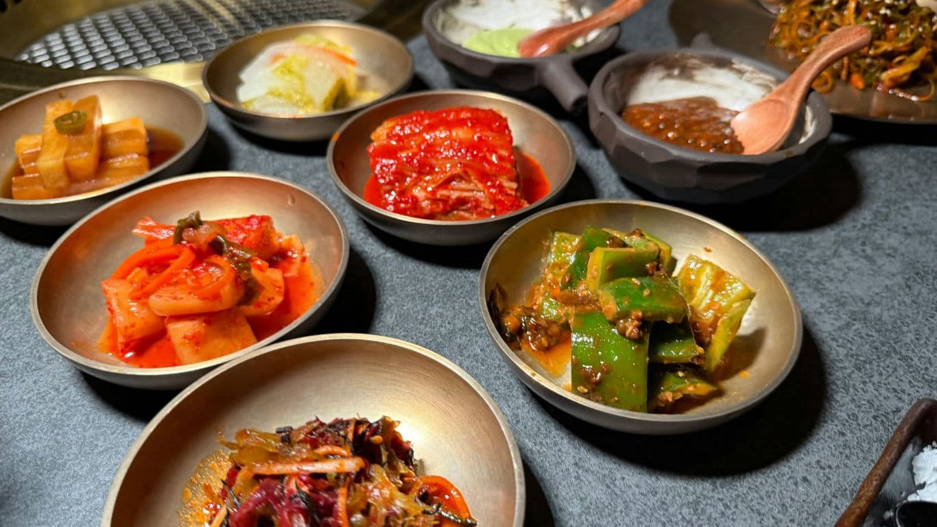 Assorted Korean banchan side dishes on table