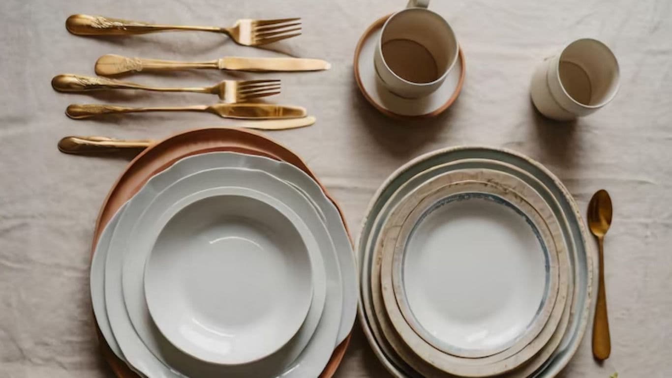 Elegant tableware with gold utensils