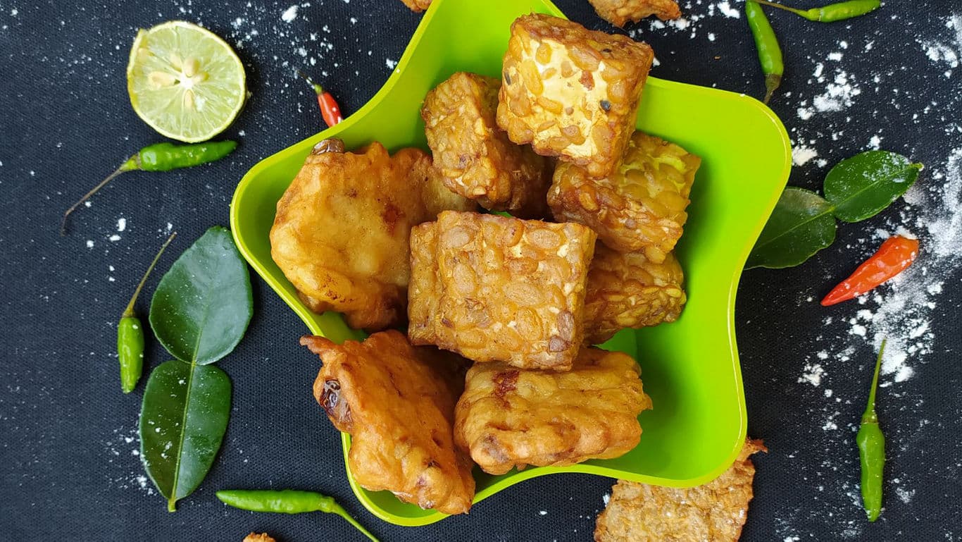 Fried Tempeh in Green Bowl with Garnishes