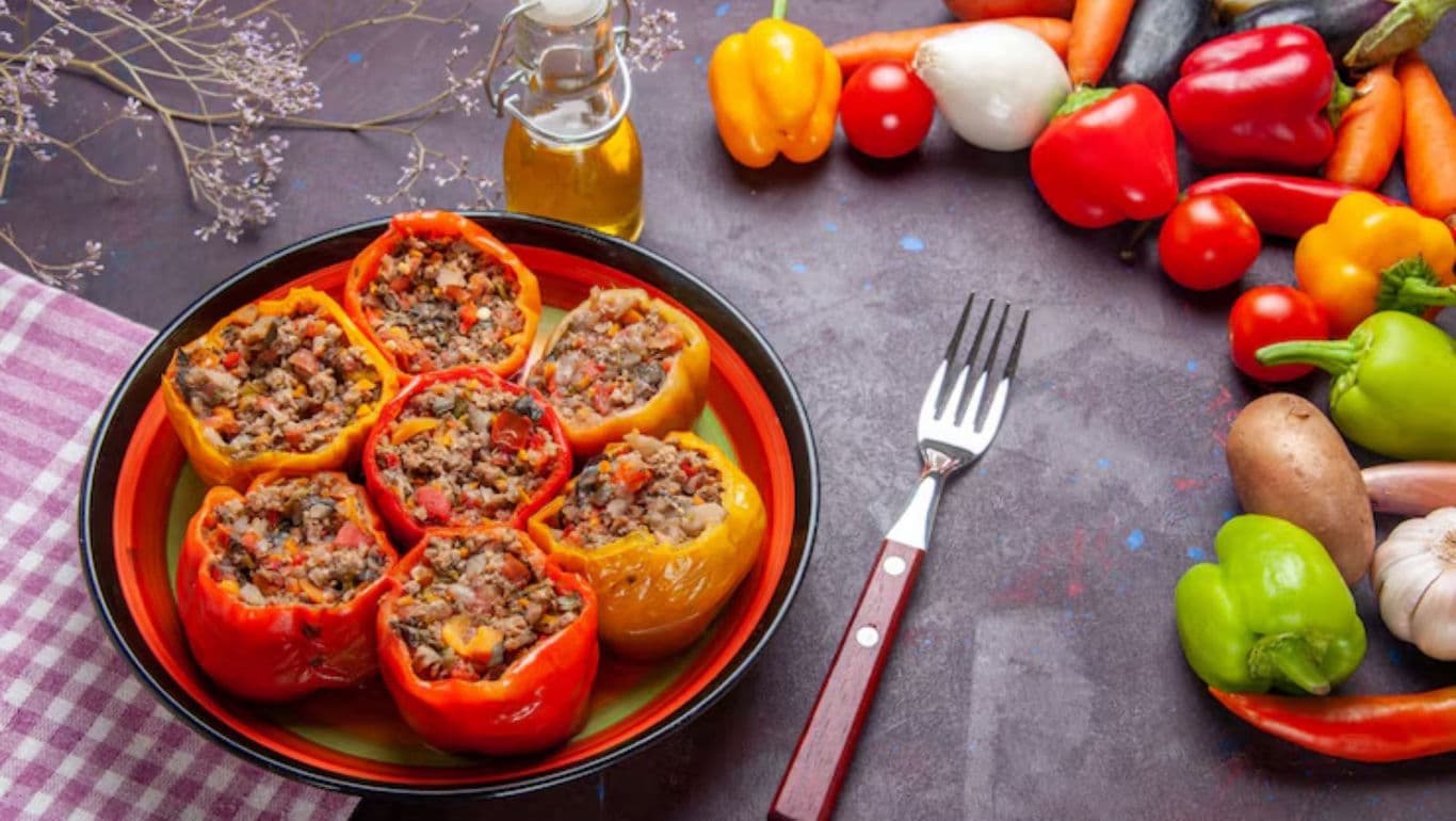 Colorful stuffed bell peppers with fresh vegetables