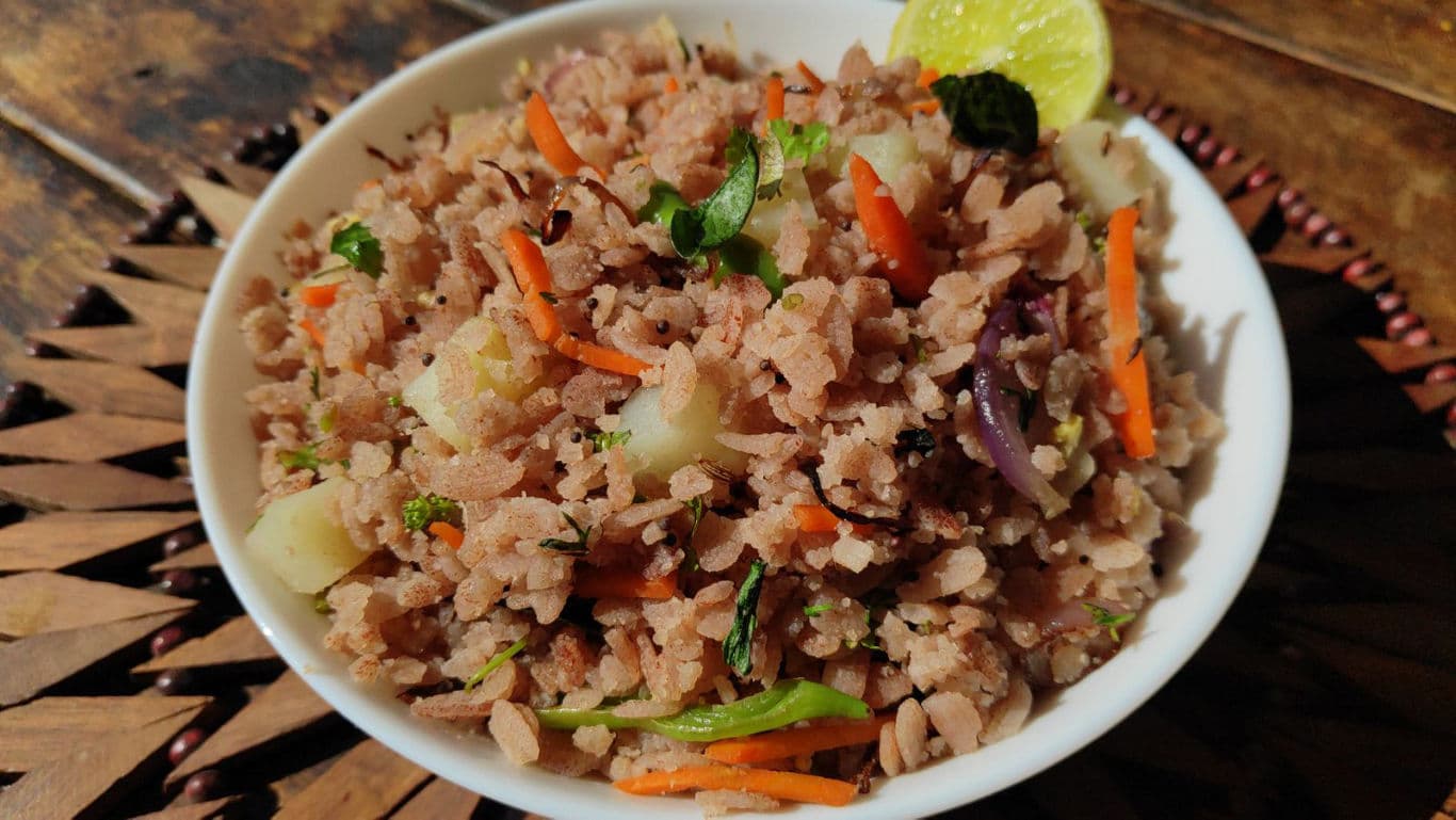 Healthy vegetable poha in white bowl