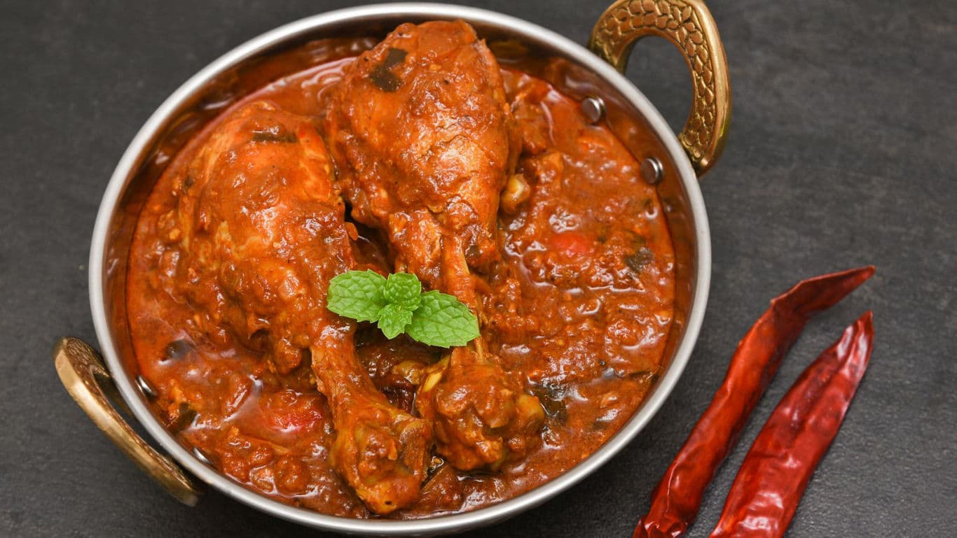 Spicy Chicken Curry in Traditional Bowl