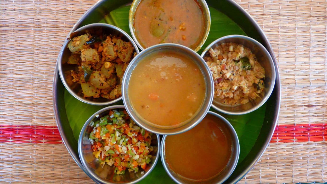 Traditional South Indian Vegetarian Thali on Banana Leaf