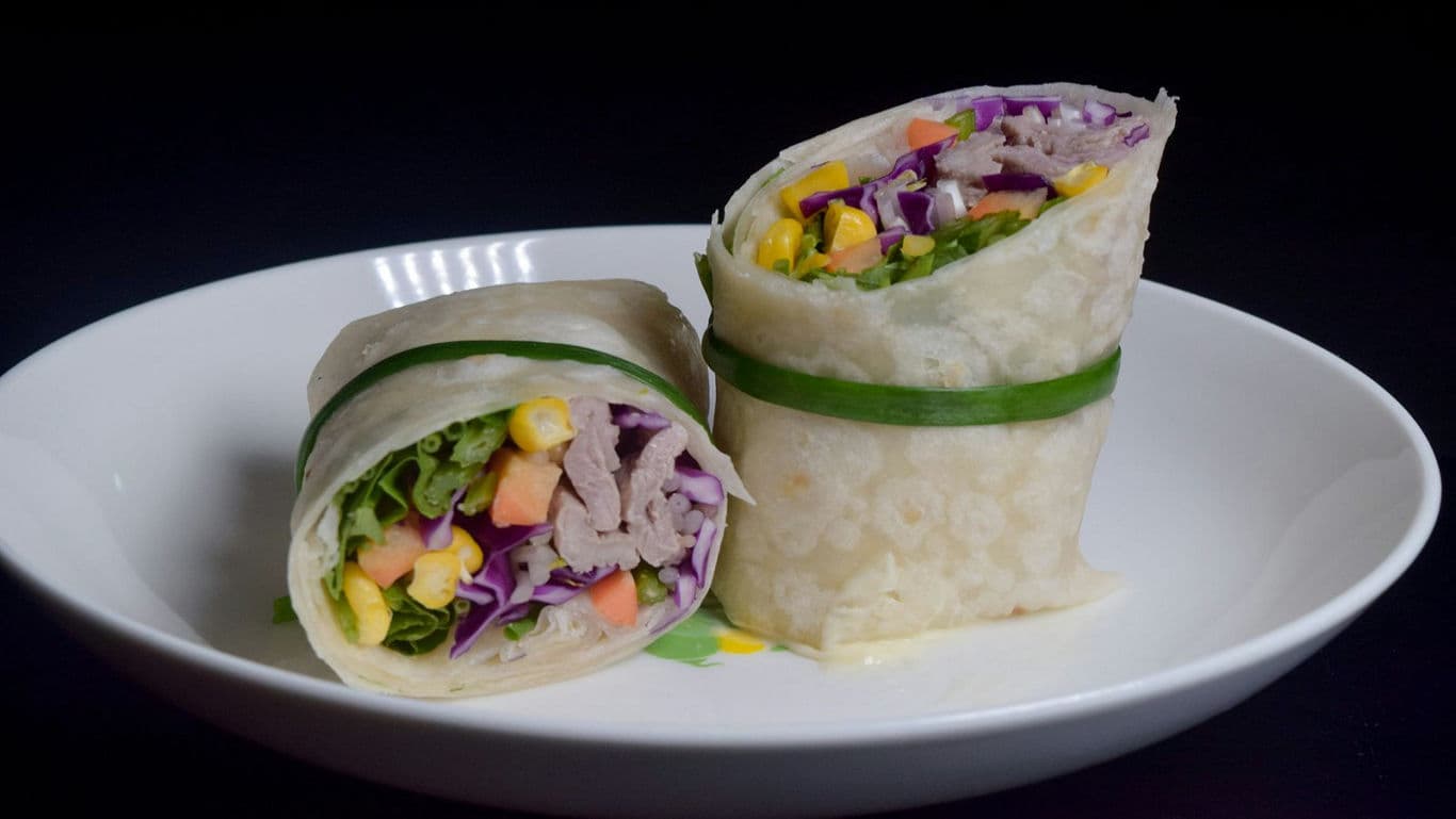 Fresh vegetable rice paper wraps on plate