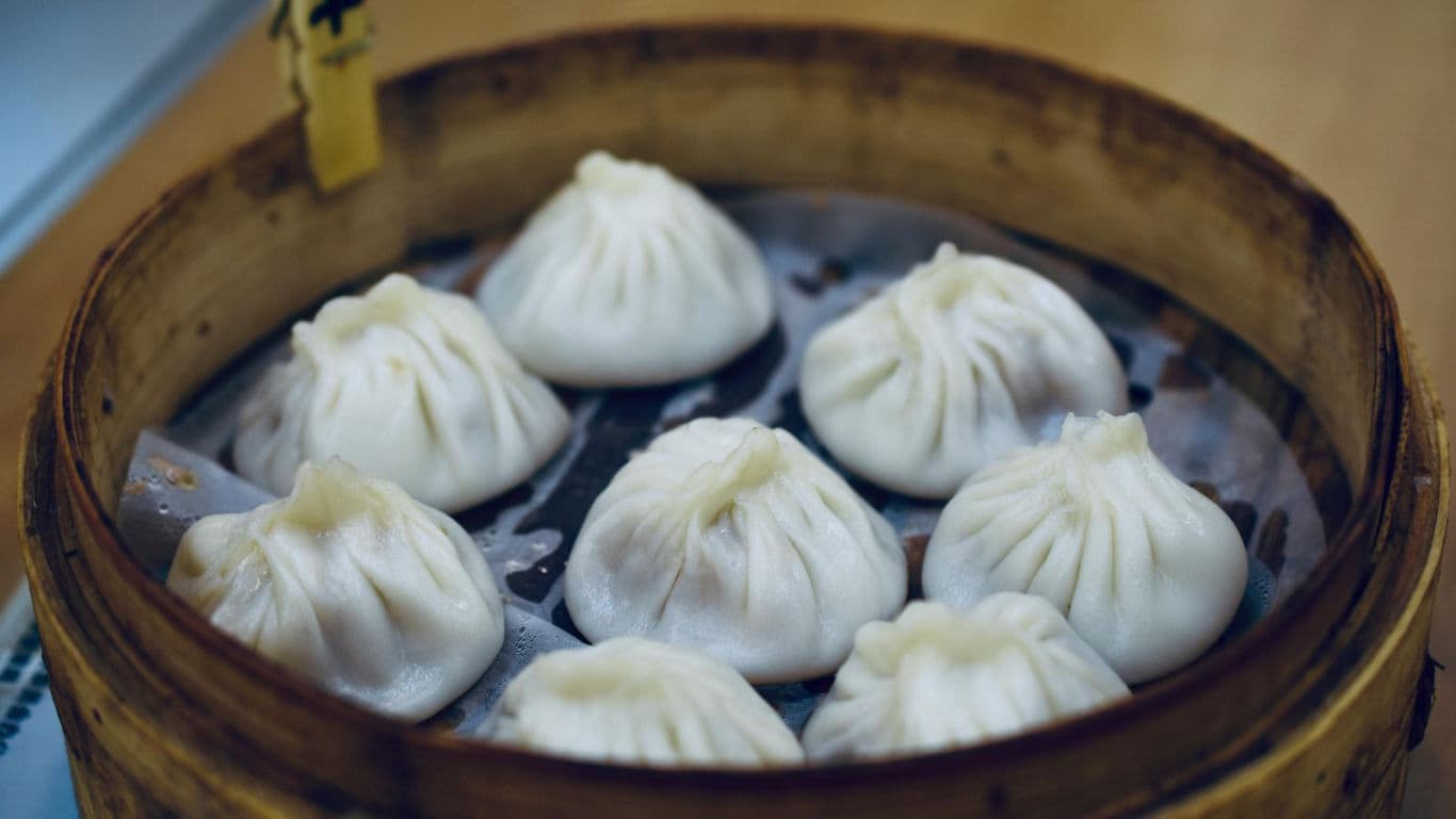 Steamed soup dumplings in bamboo basket