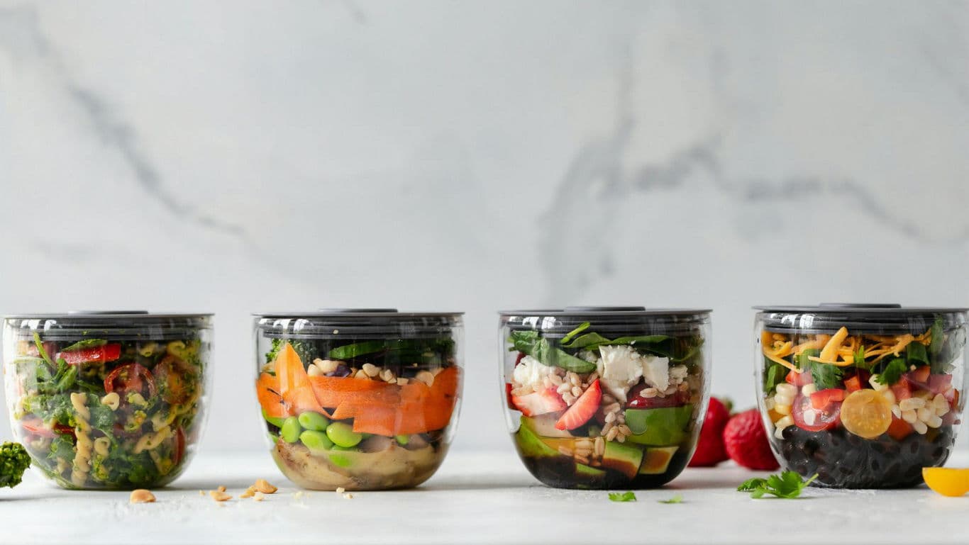 Assorted Fresh Salad Bowls in Clear Plastic Containers