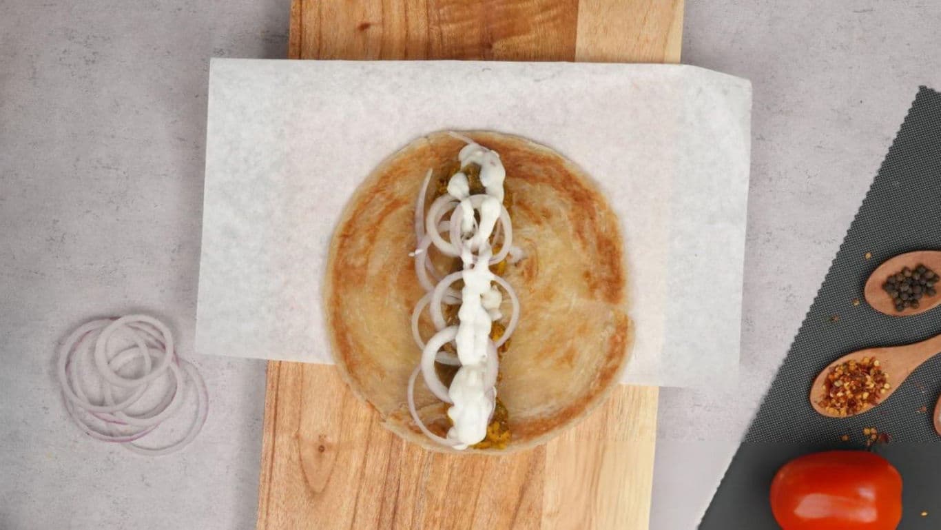 Flatbread wrap with onions and sauce