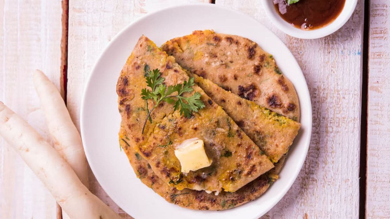 Stuffed paratha with butter and chutney