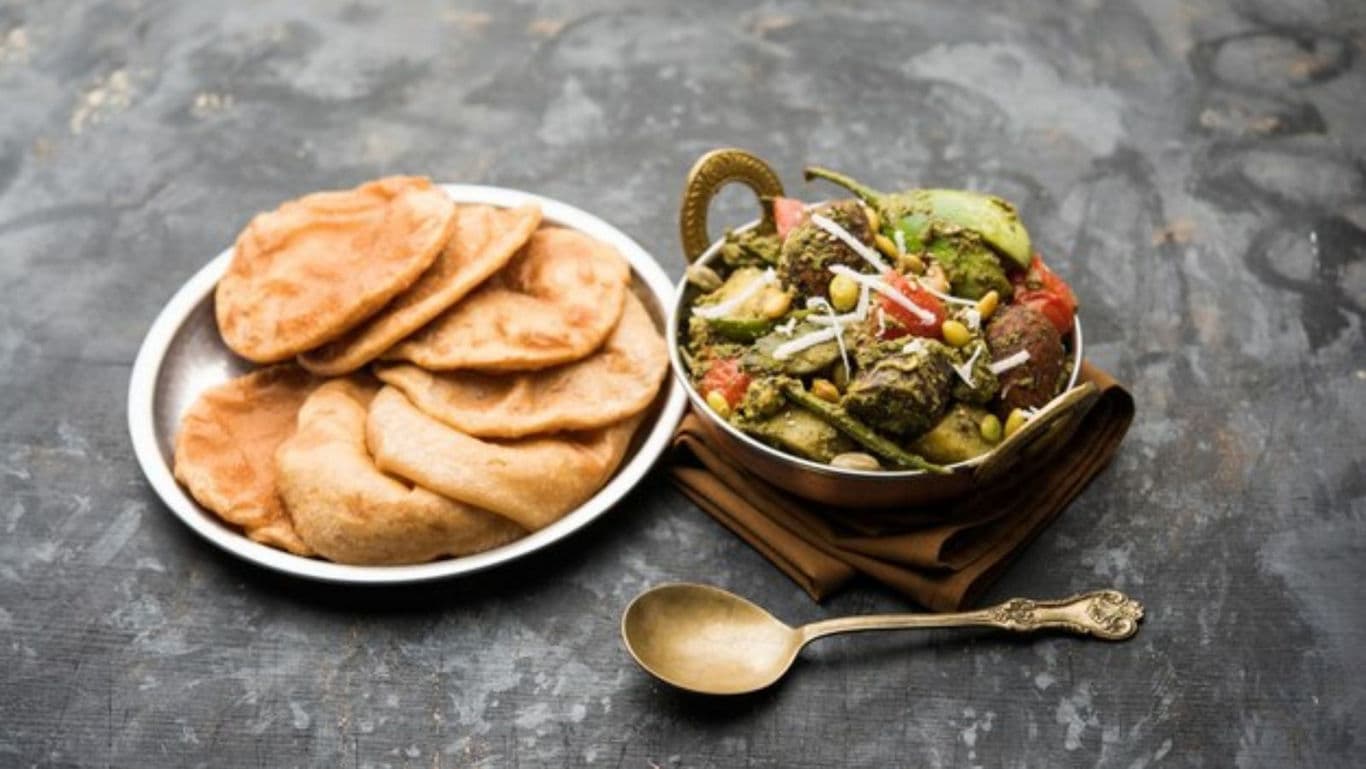 Traditional Indian Poori with Mixed Vegetable Curry