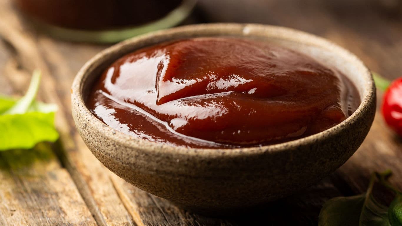 A small bowl of ketchup.